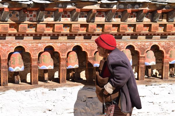 Bhutanese Women Rotating Prayer Wheels